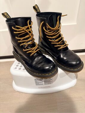 Dr. Martens Black Leather Combat Boots with Yellow Laces